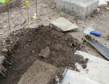 Stone found underground is uncovered – Photo by Jerry Prouhet